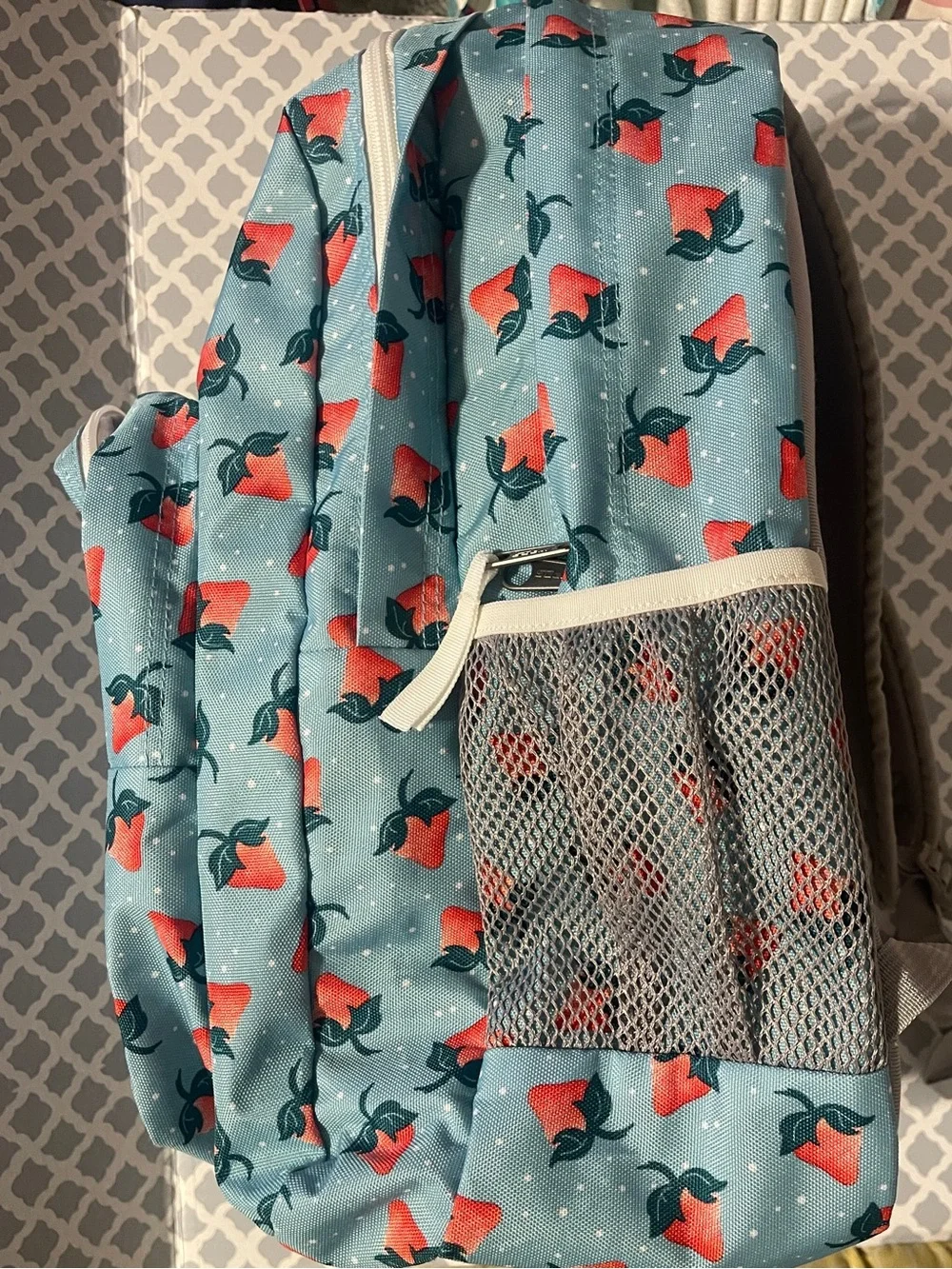 Trans by Jansport Teal Strawberry and  Polkadot print Backpack